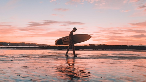 Surfer on Costa Rica's Pacific coast